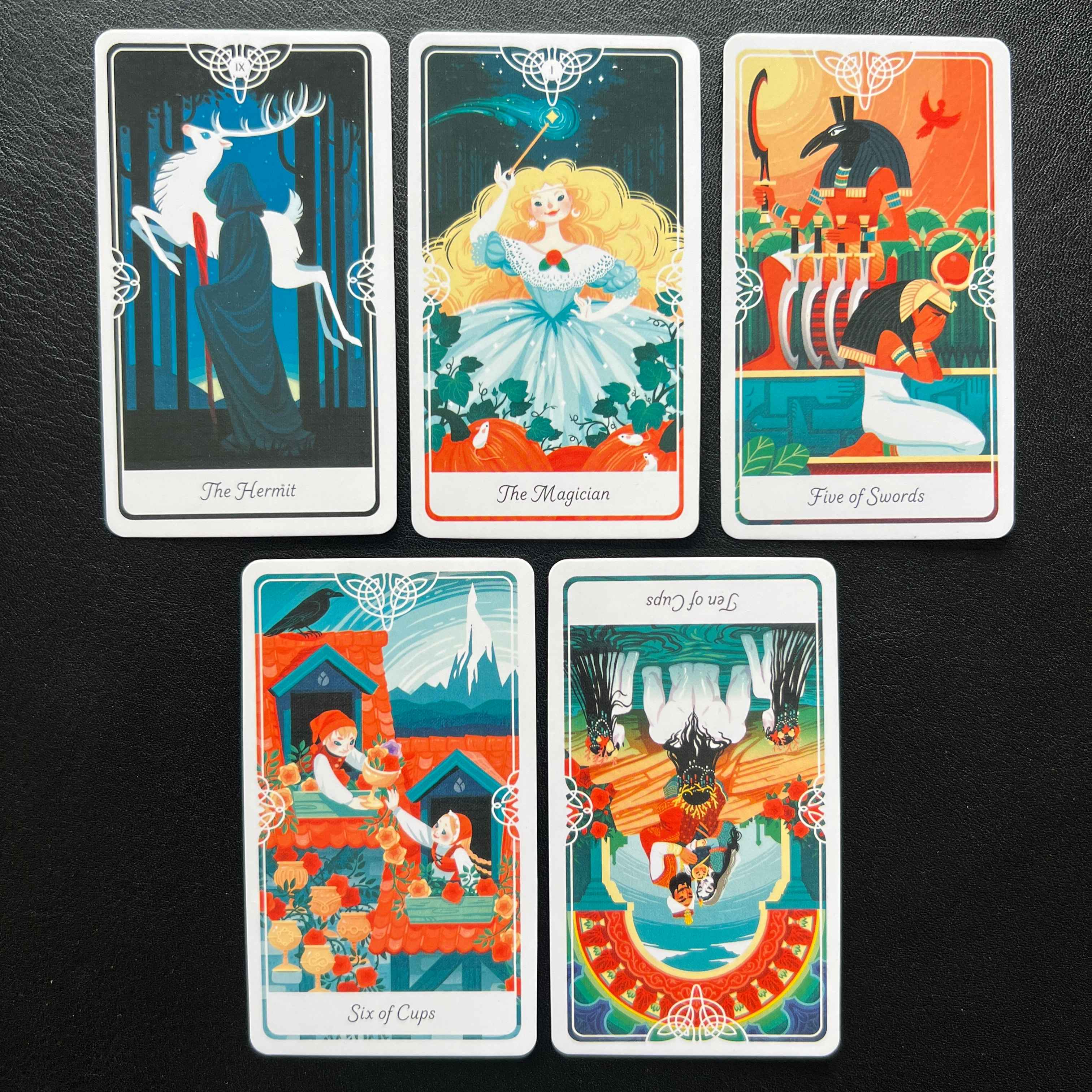The Magician, The Hermit, Five of Swords, Six of Cups, Ten of Cups reversed